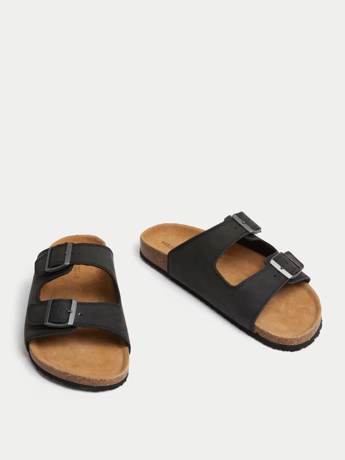 Black sandals with silver buckle details