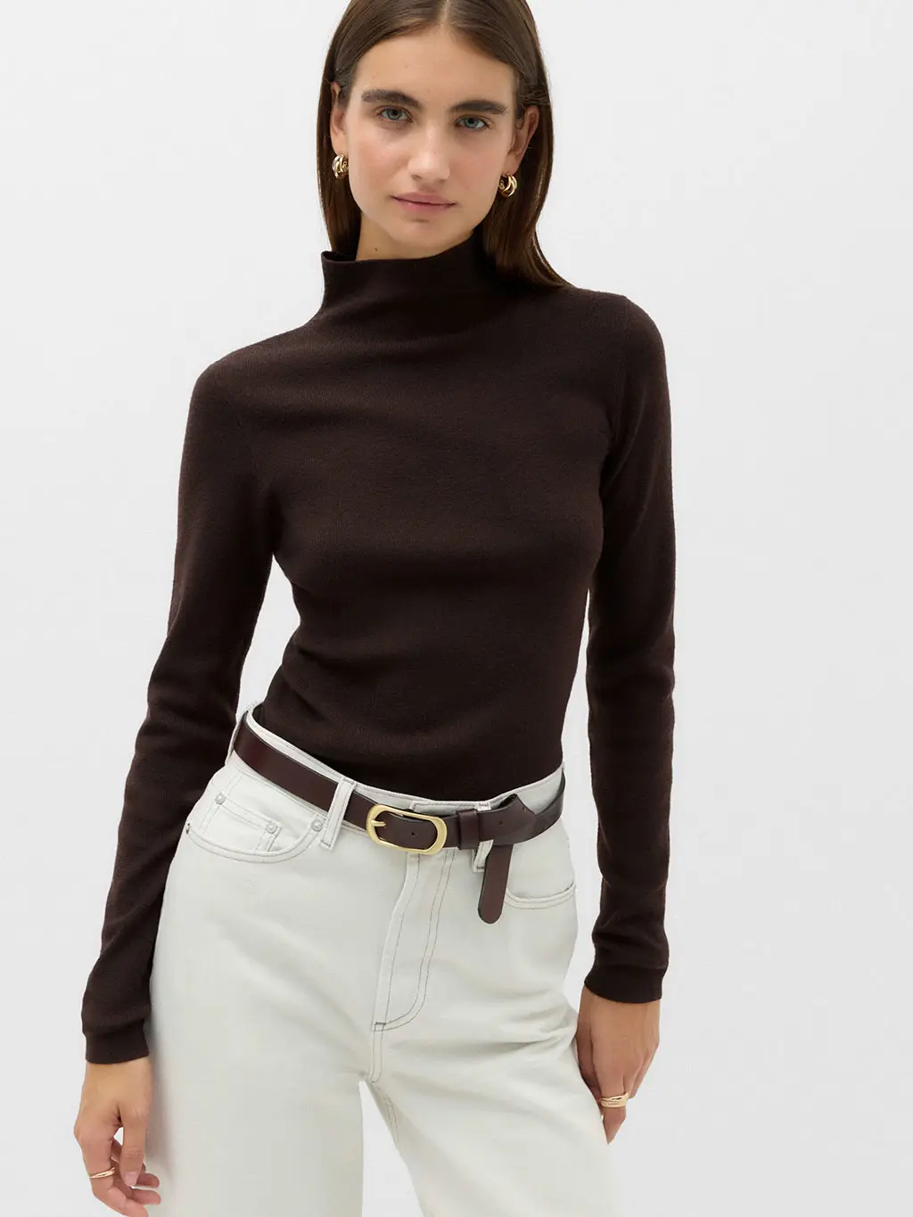 Woman in turtleneck and jeans