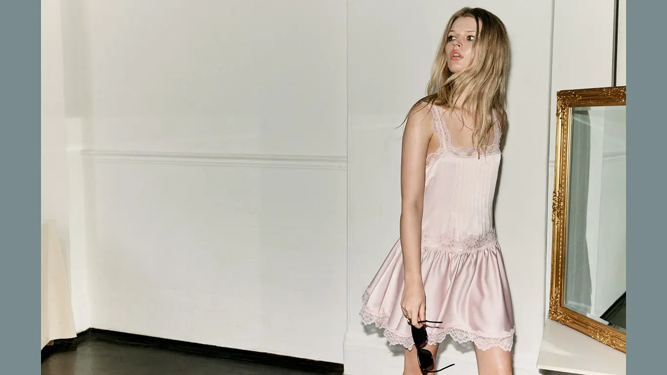 Woman wearing pink satin dress