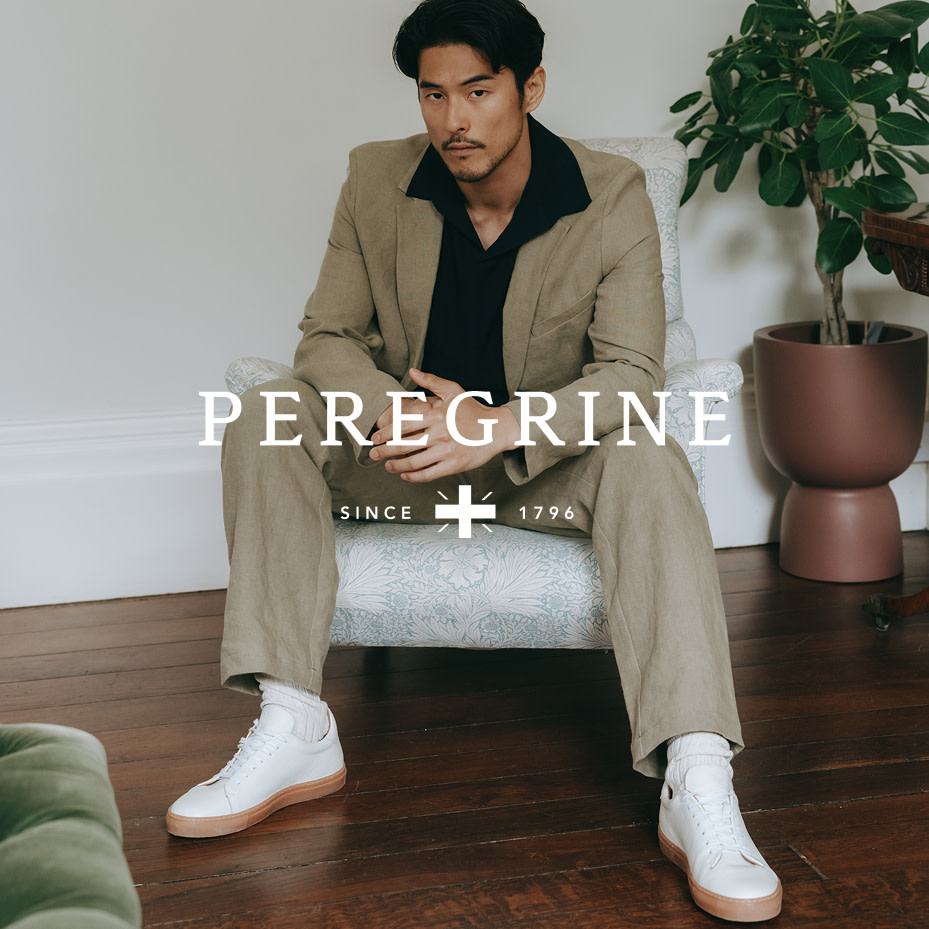 Man wearing brown suit