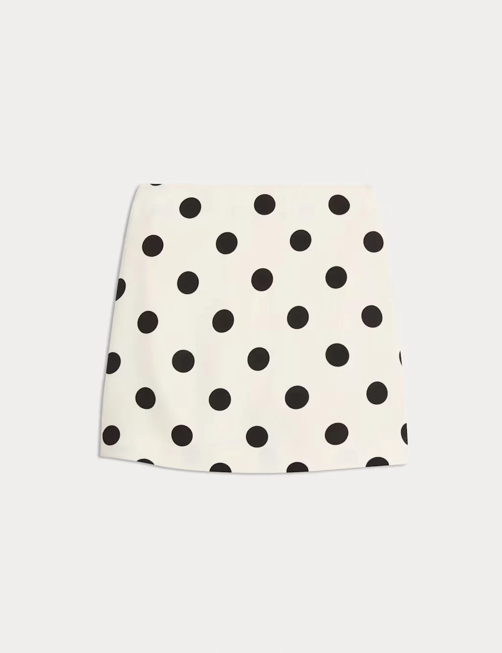 White mini skirt with black polka dots