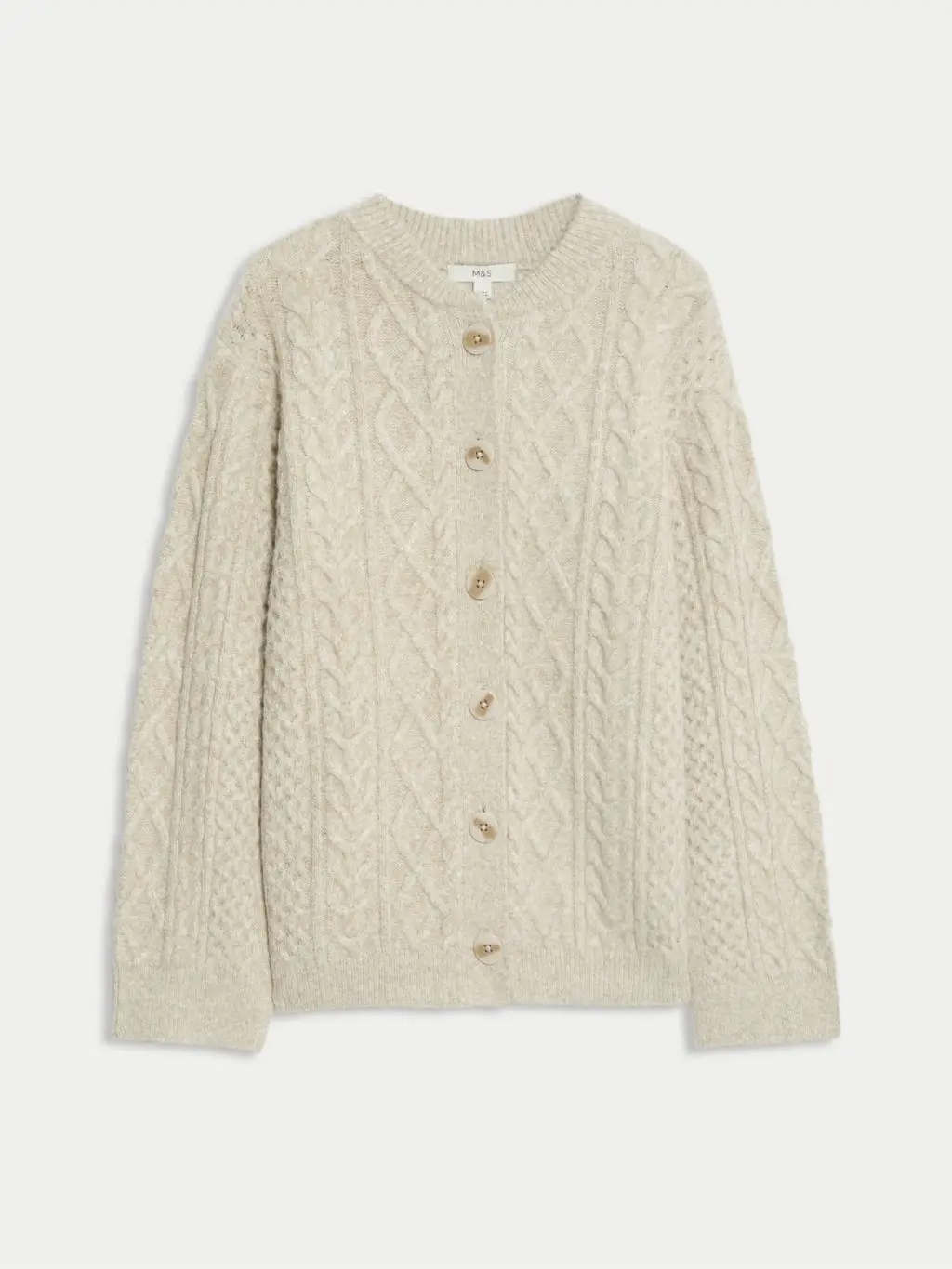 A Cutout of a cream cable knit jumper by M&S