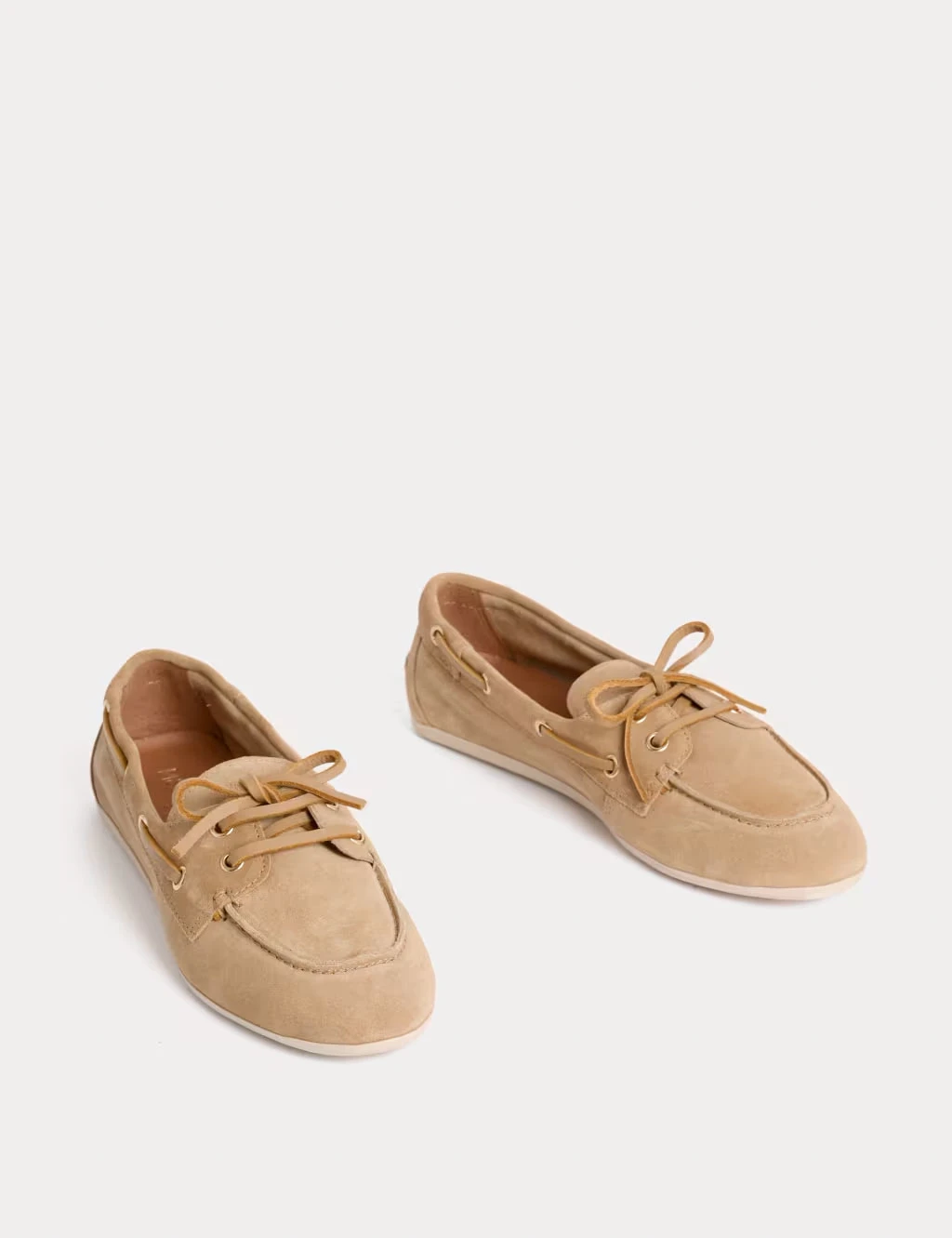 Tan suede boat shoes