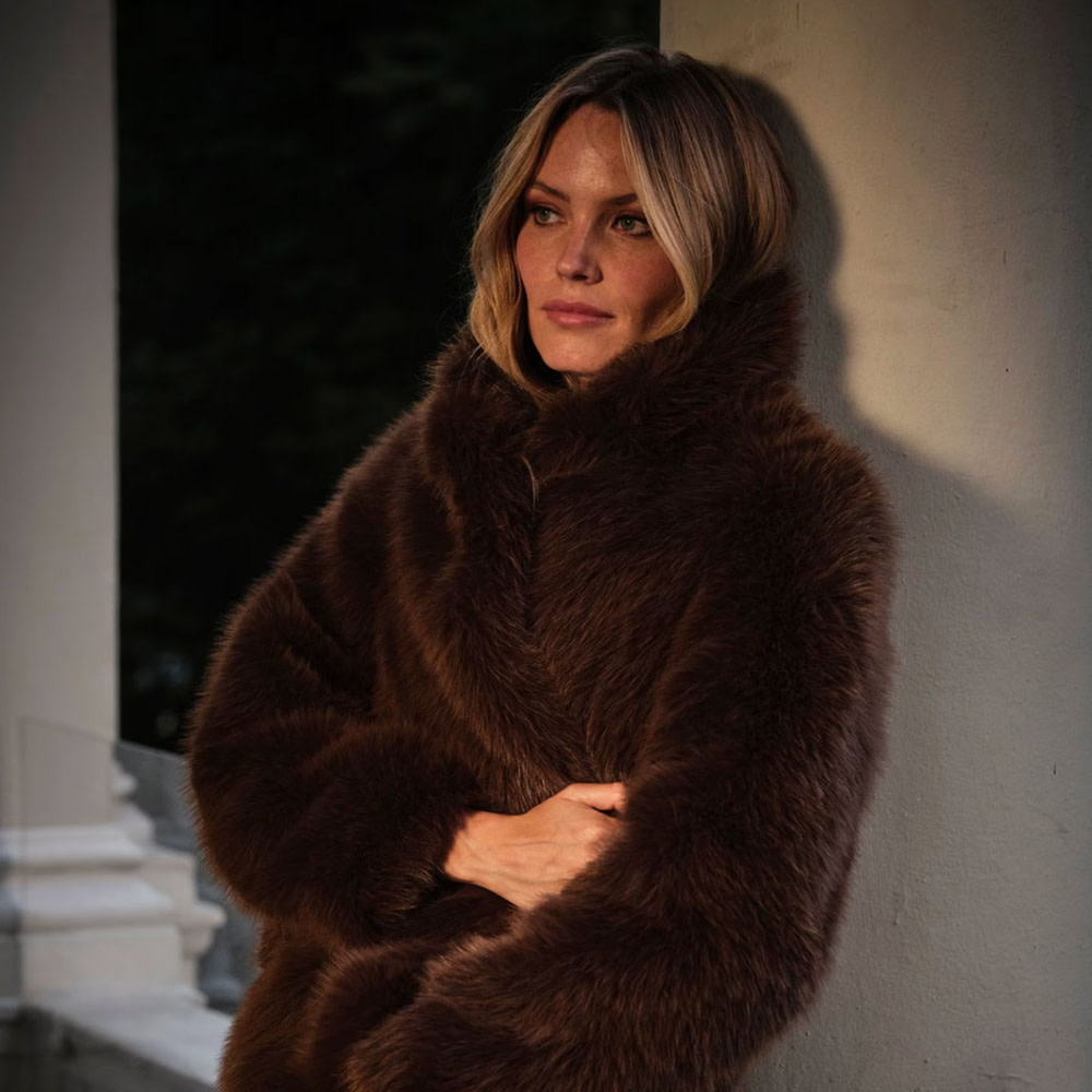 Woman wearing brown faux-fur coat