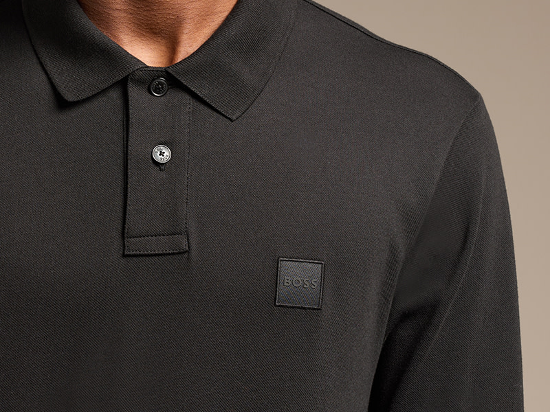 man wearing black rugby jumper