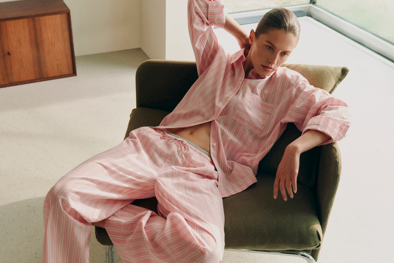 Woman in pink pyjamas