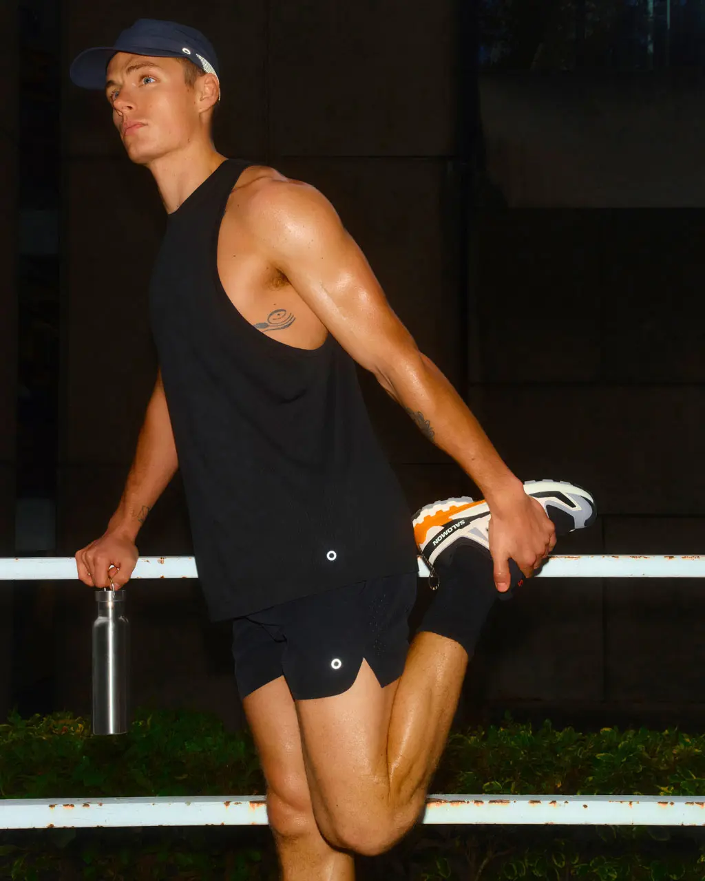 Man wearing black running gear