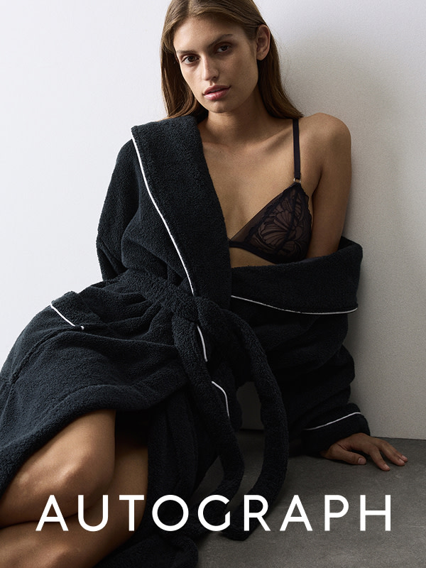 Woman in black dressing gown