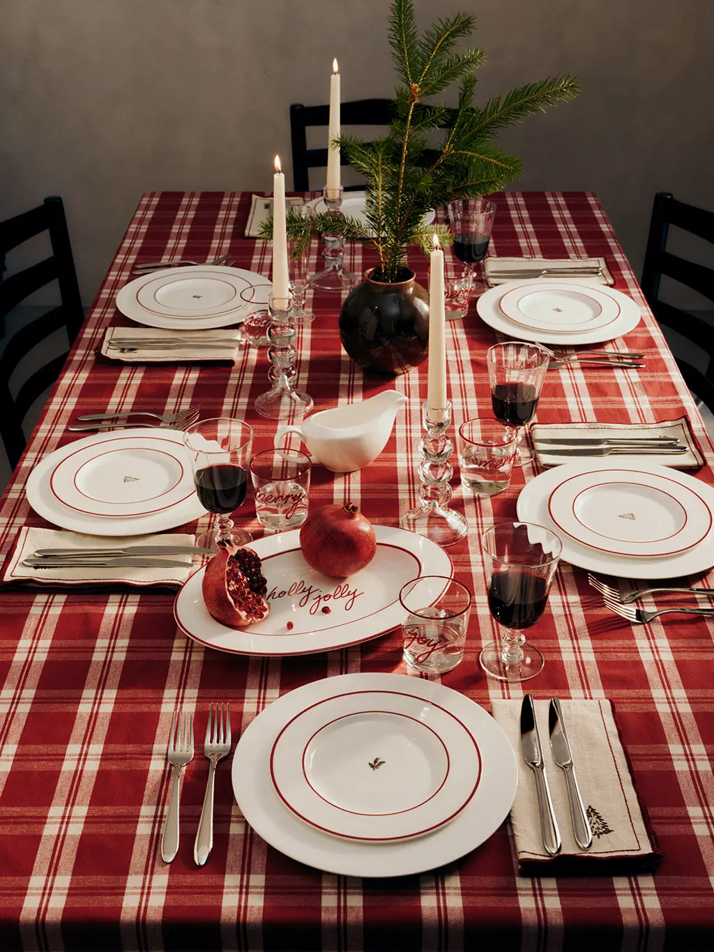 Christmas table with red plaid tablecloth