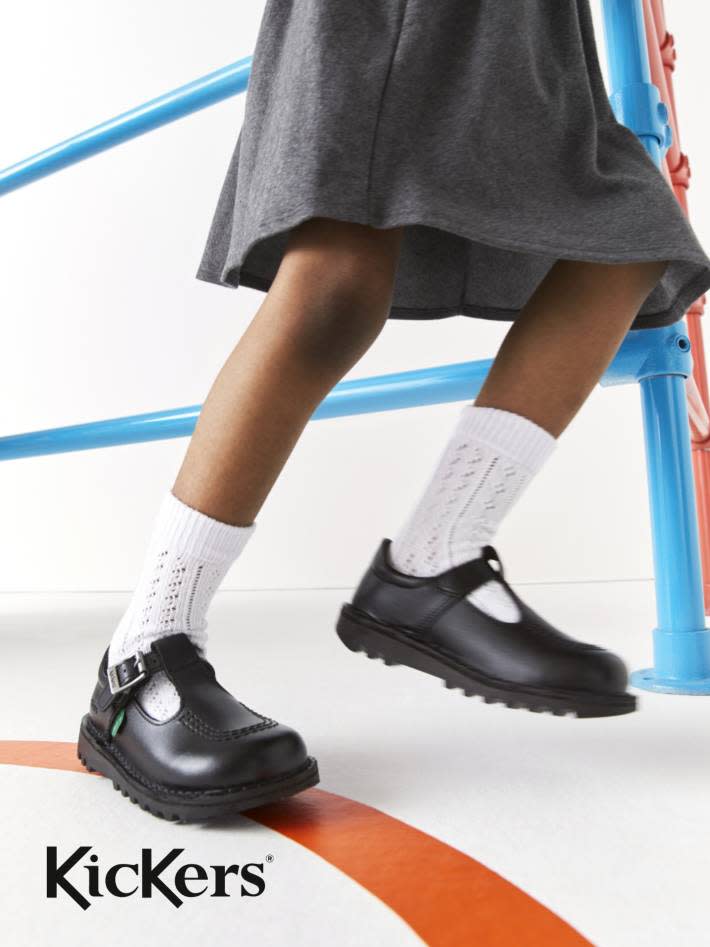 Girl wearing Kickers school shoes. Shop Kickers