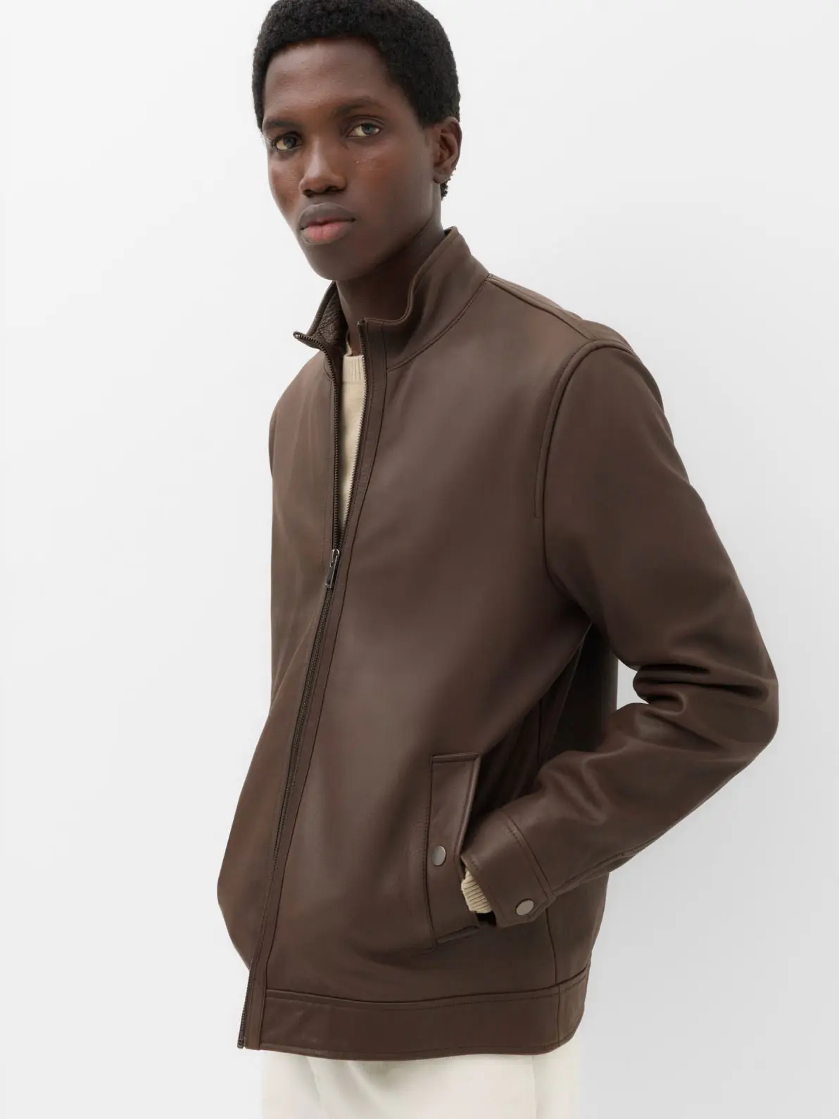 Man wearing brown leather jacket 
