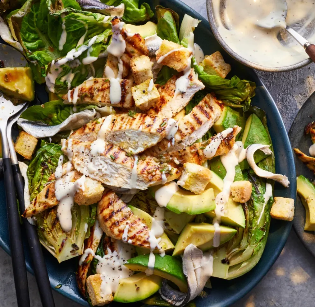 Grilled gem lettuce avocado Caesar salad 