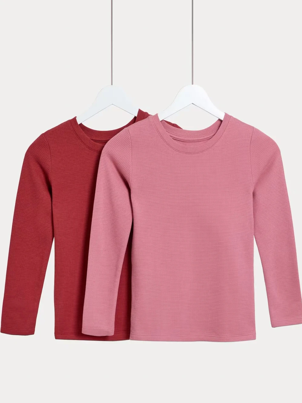 Two pack of girls' burgundy and pink waffle thermal tops