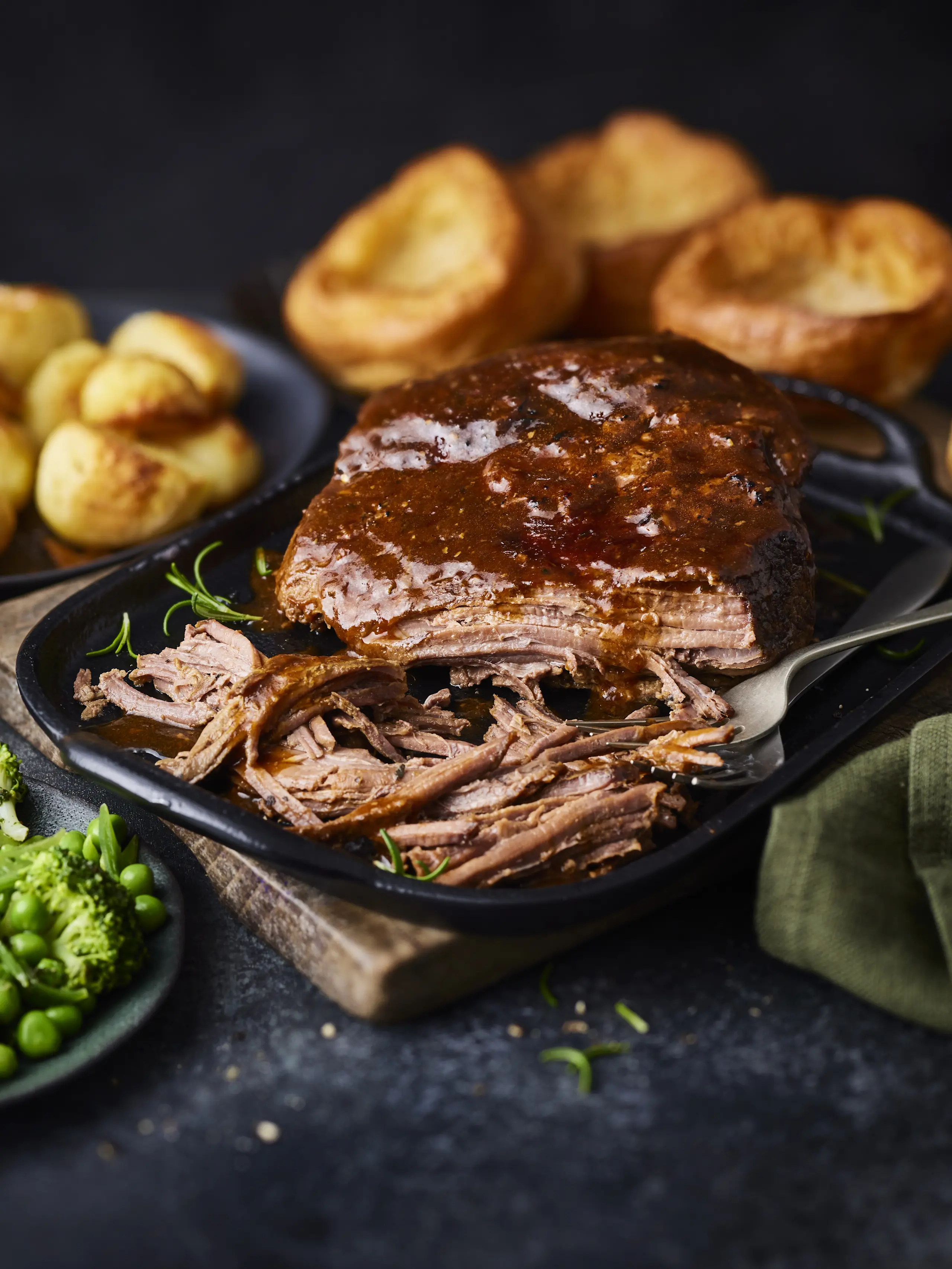 Roast beef brisket on black plate