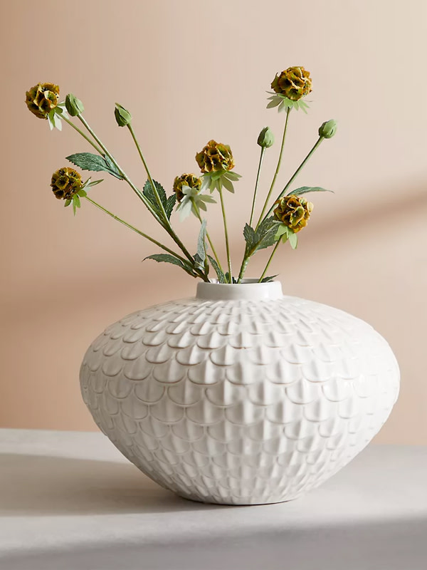 Pot with flowers. Shop housewarming gifts