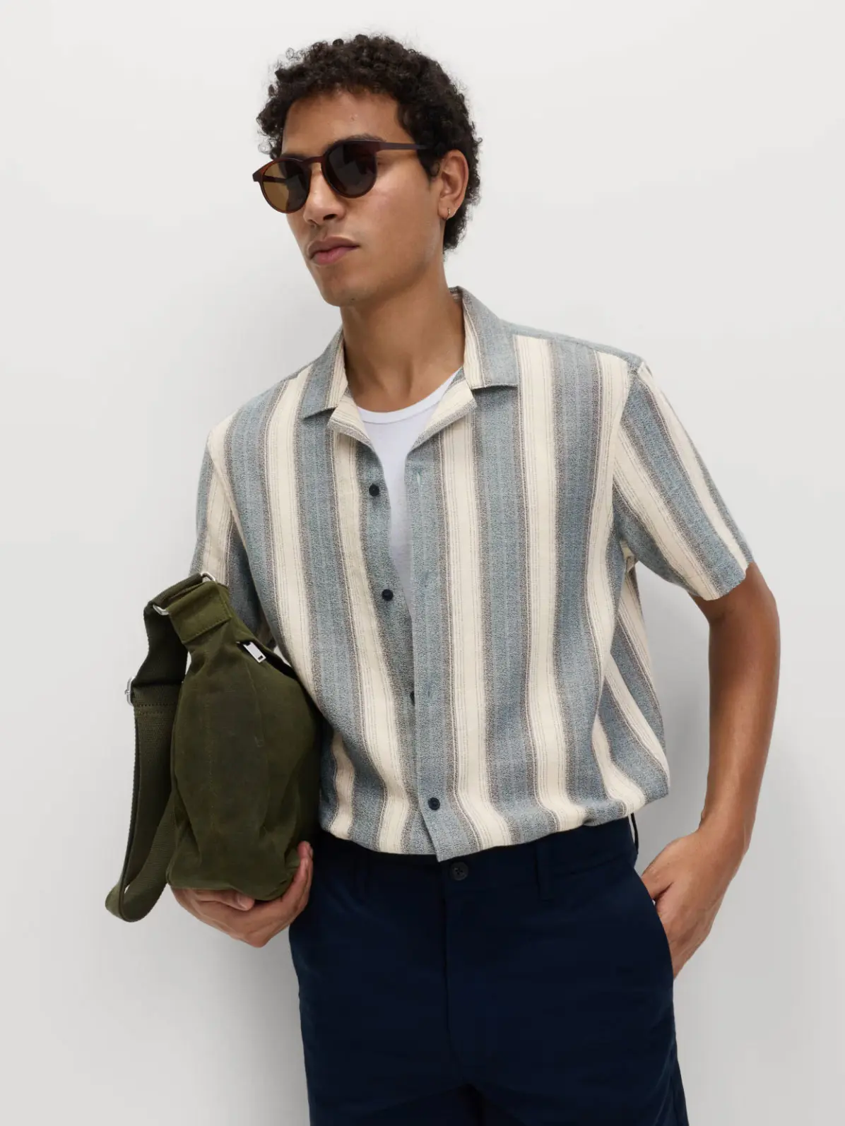 Man wearing striped shirt 