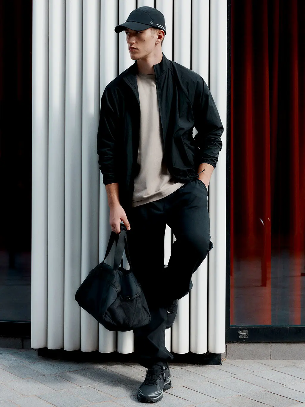 Man holding gym bag