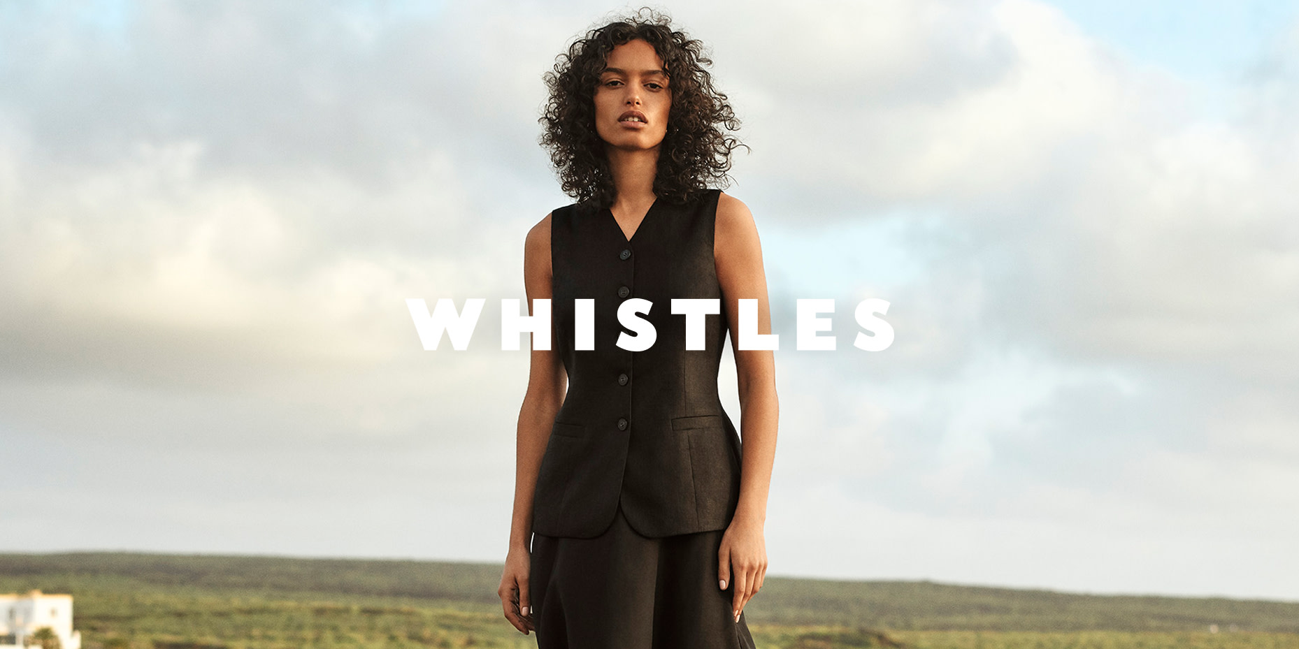 Woman wearing a black tailored waistcoat