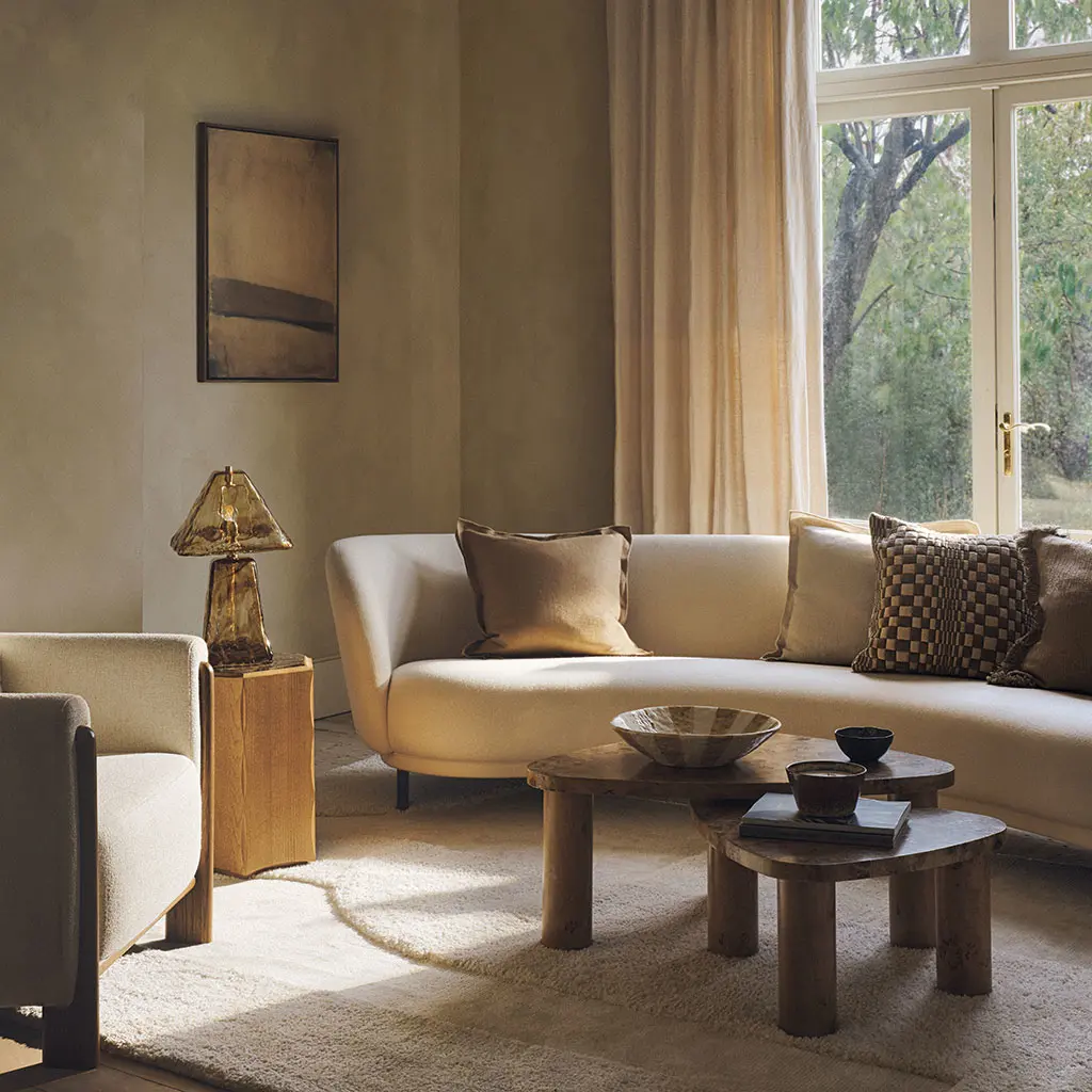 Living room space with soft neutral furniture and soft furnishings