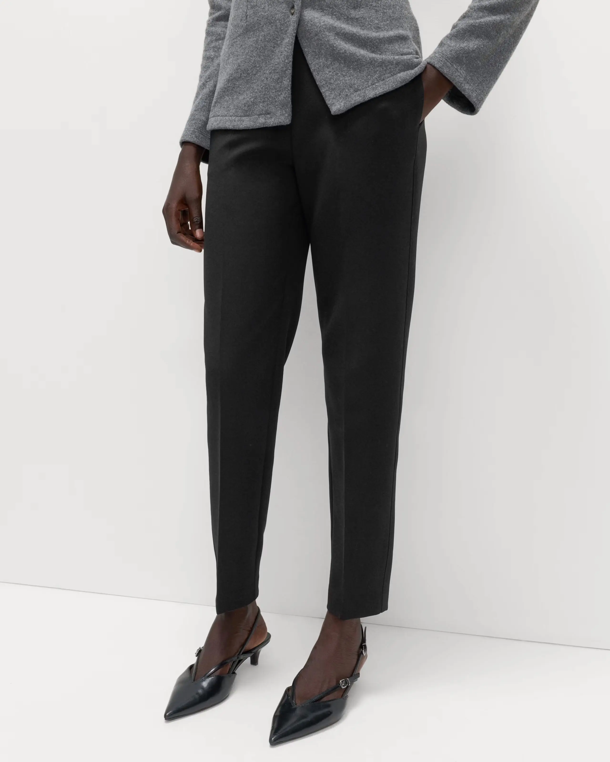 Woman wearing tapered trousers