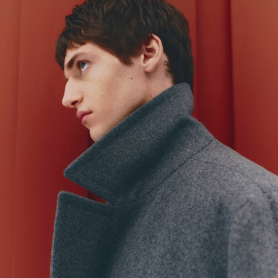 Man wearing grey jacket