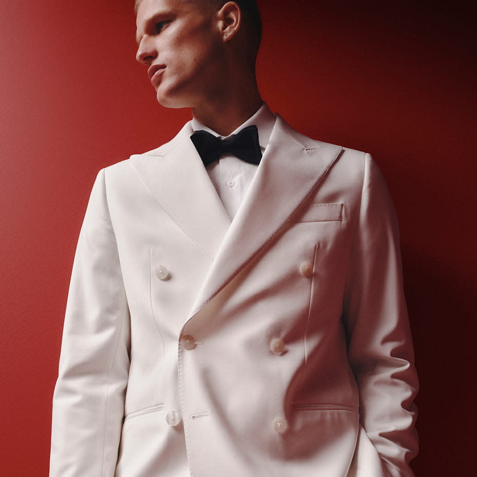Man in white suit
