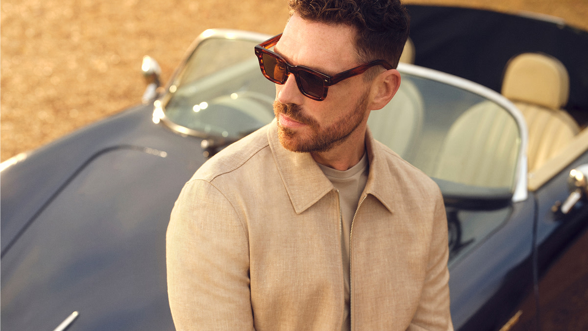 James Nelson Joyce wearing cream shirt