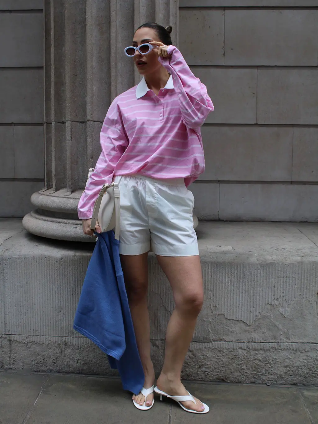 Woman in pink rugby top