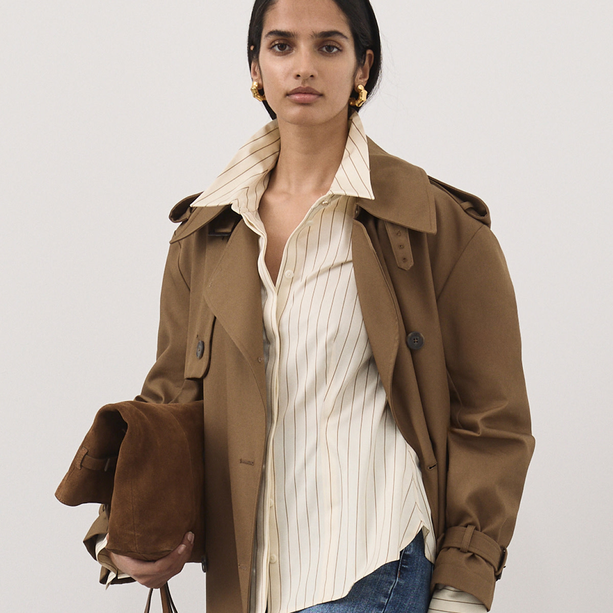 Woman wearing brown jacket