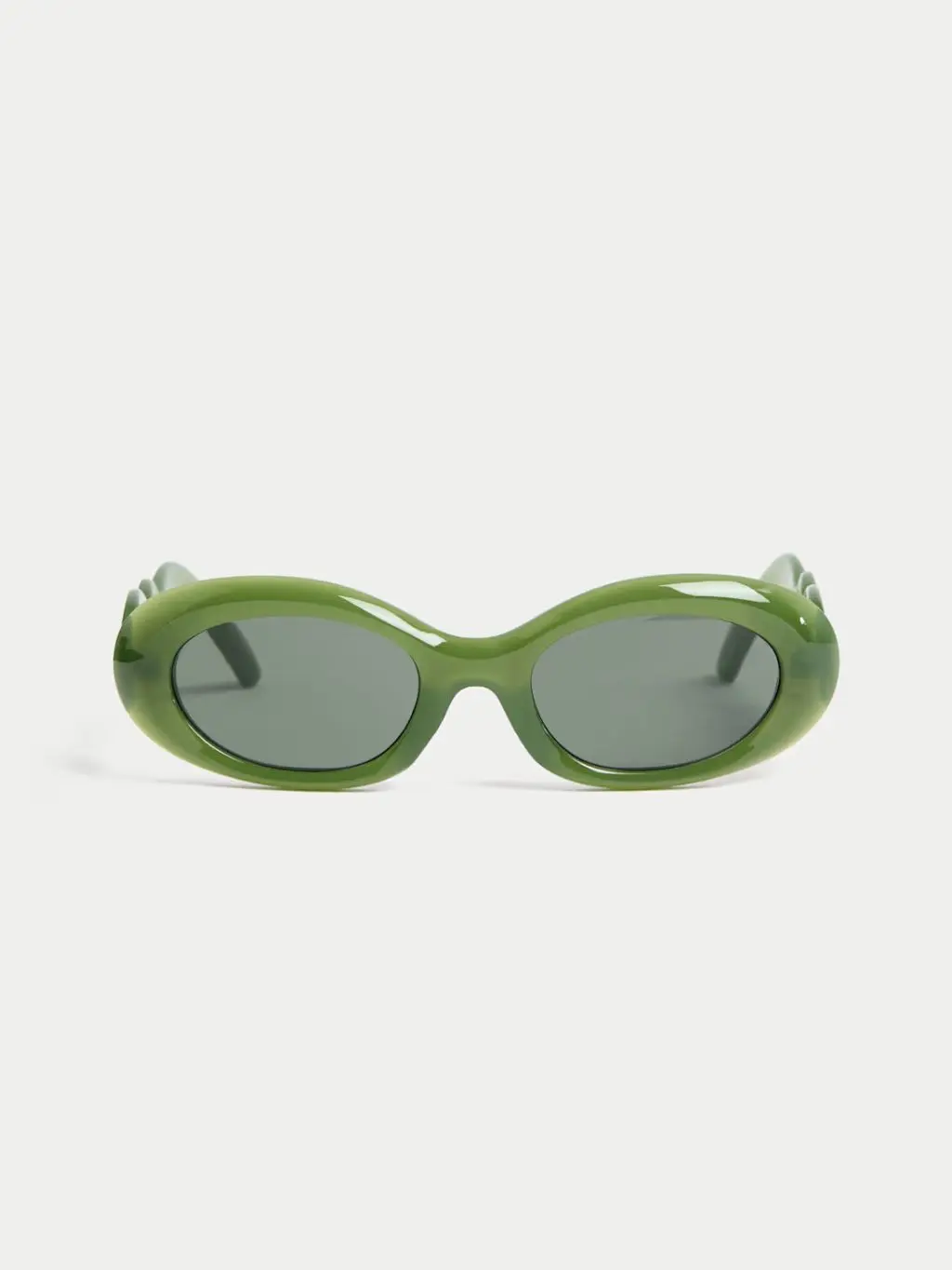 A cutout of retro green frame sunglasses