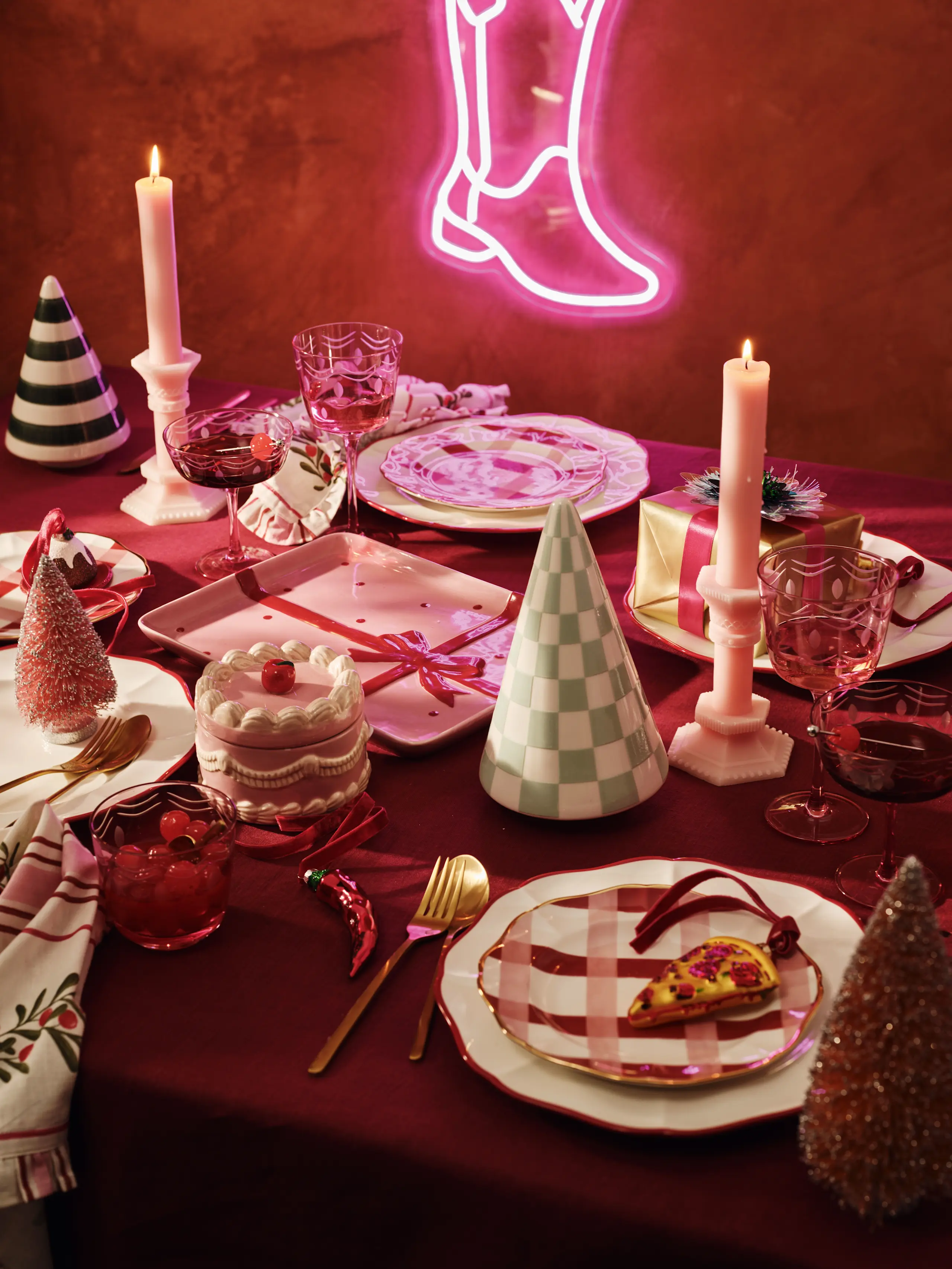 Image of retro table decor including colourful plates and candles
