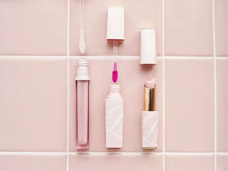Three lip products in pink