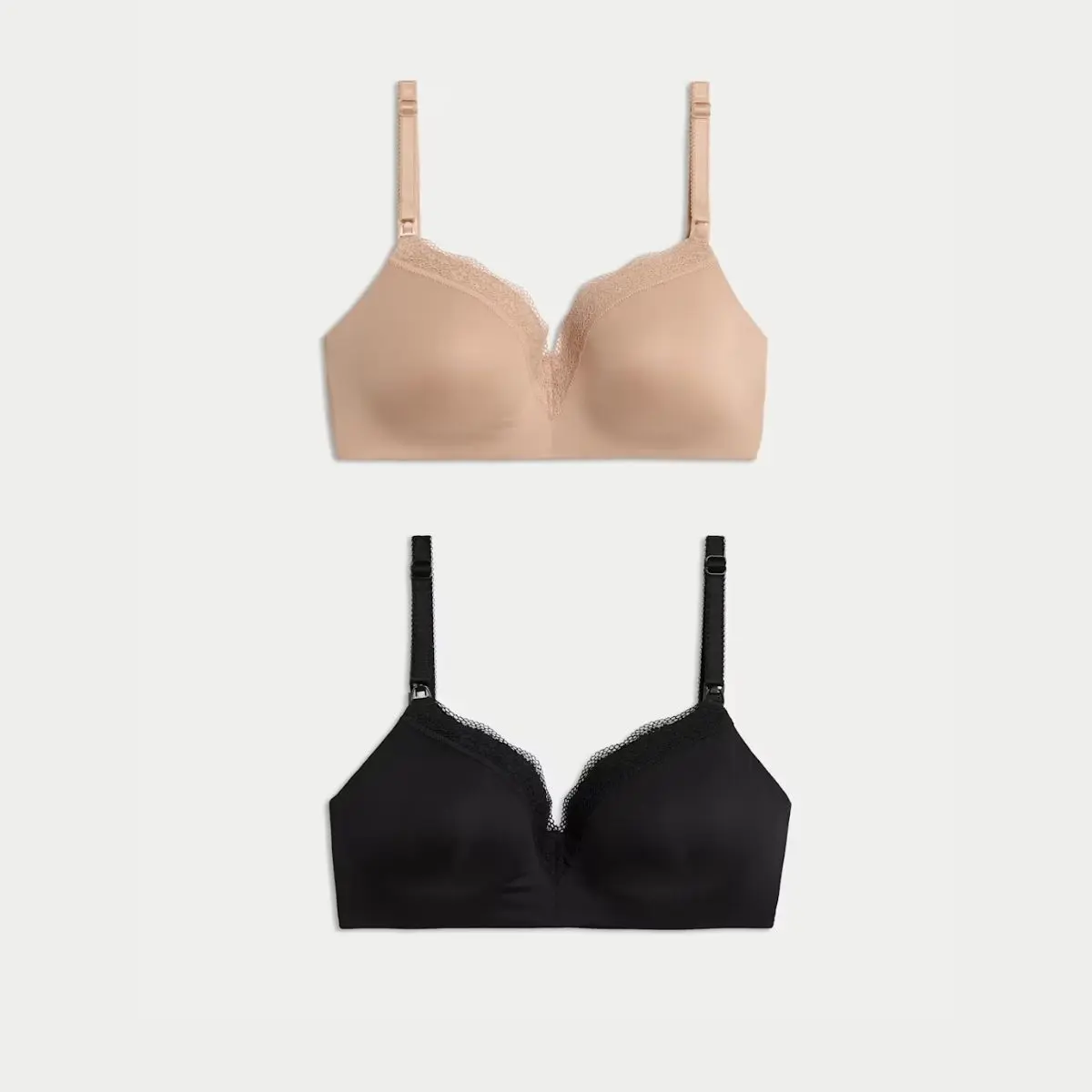 A cut out of two nursing bras by M&S - one is flesh coloured, the other is black