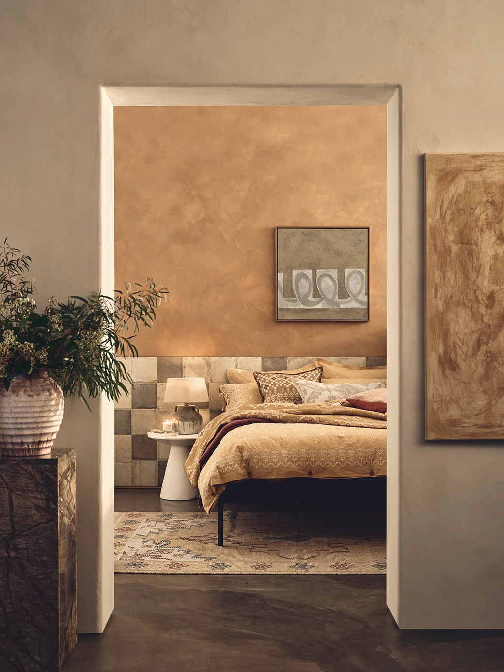 Bedroom decorated with homeware from the M&S X Fired Earth collaboration