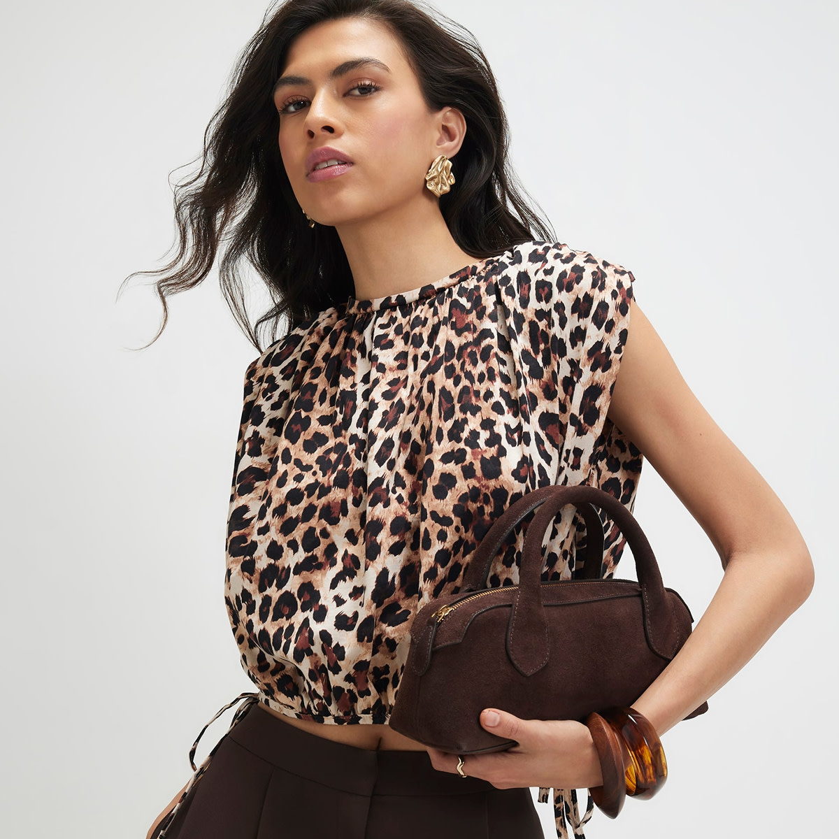 Woman wearing animal print top