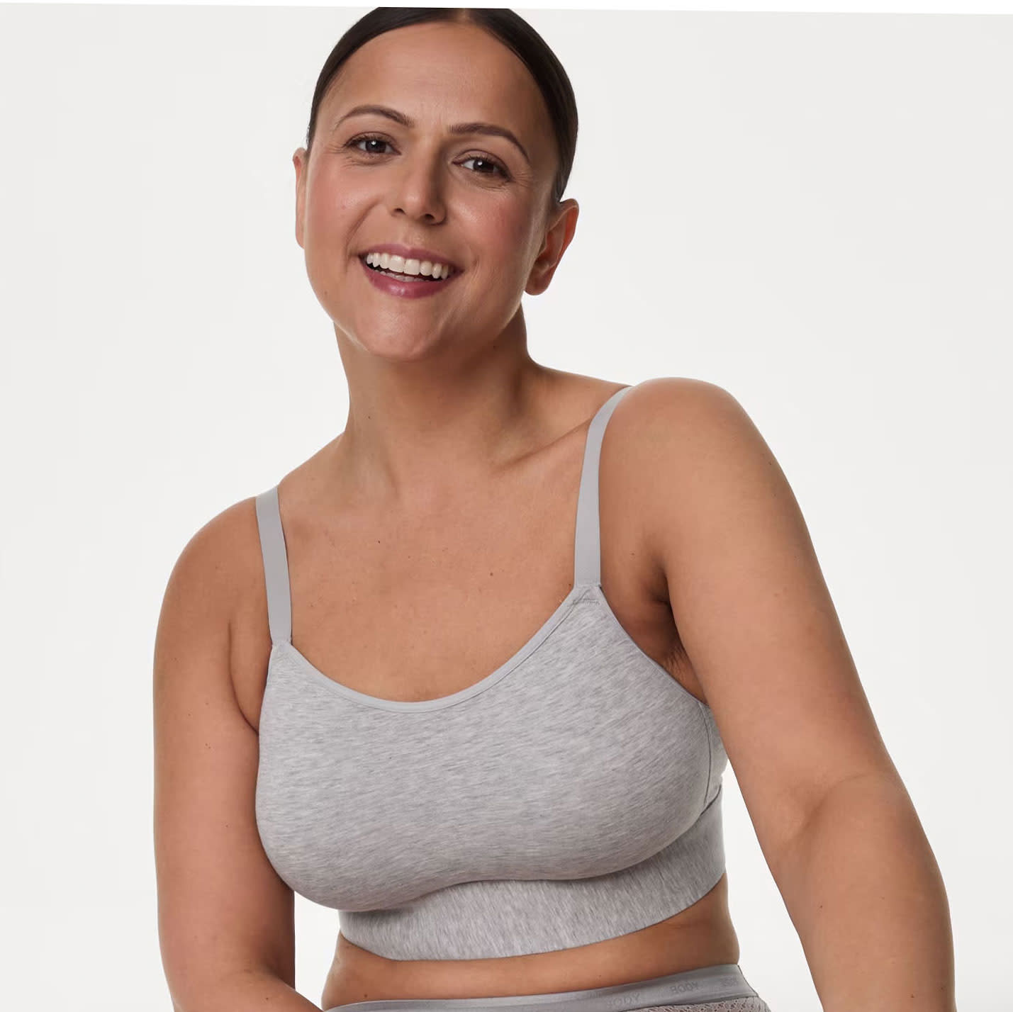 Woman wearing grey post-surgery bra