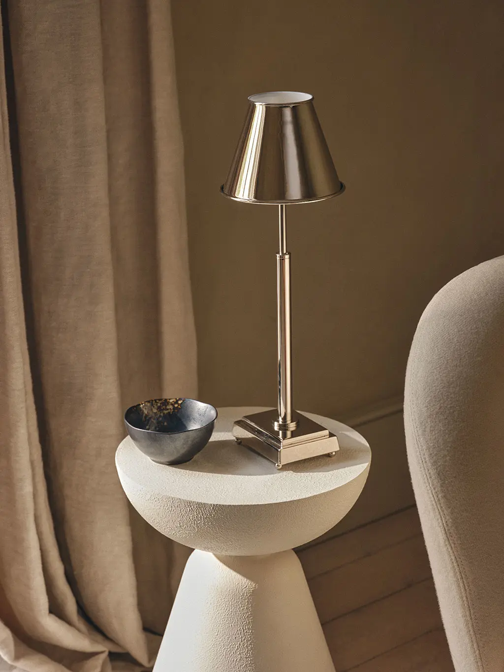 Silver lamp on white table
