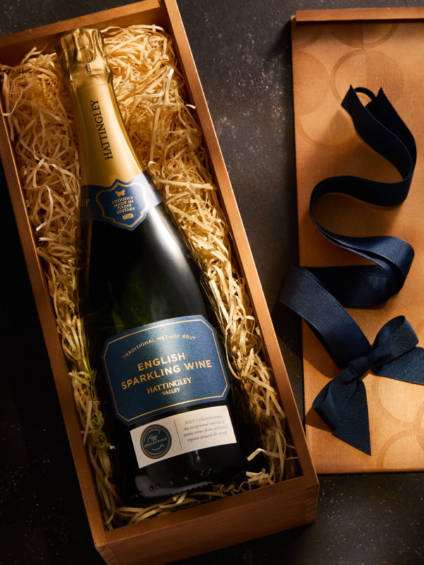 Bottle of wine in wooden box