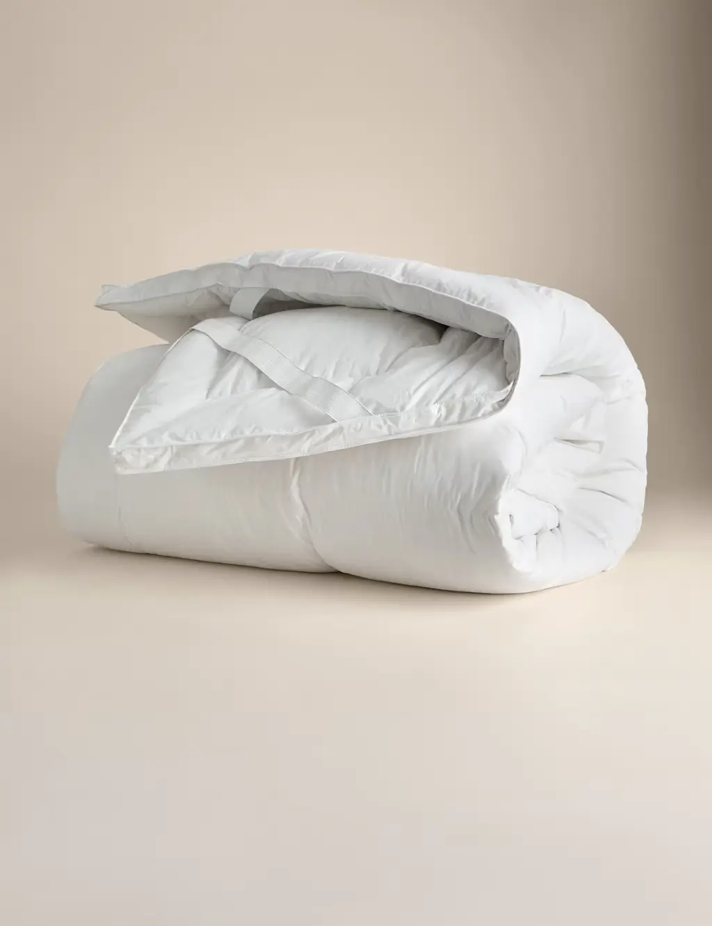 Mattress topper rolled up