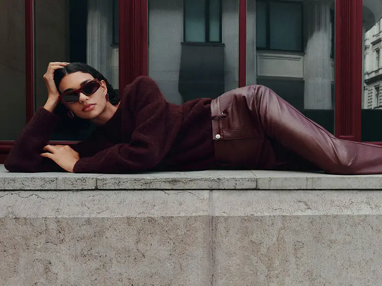 Woman wearing burgundy clothing