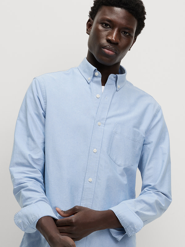 Man wearing Ultimate Oxford Shirt