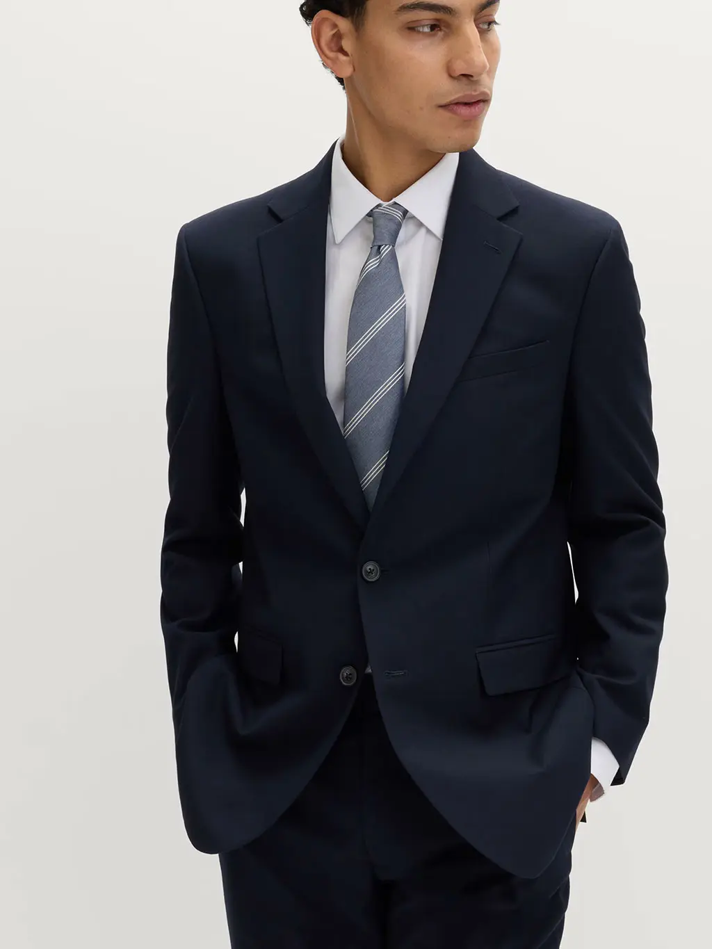 Man wearing a navy suit