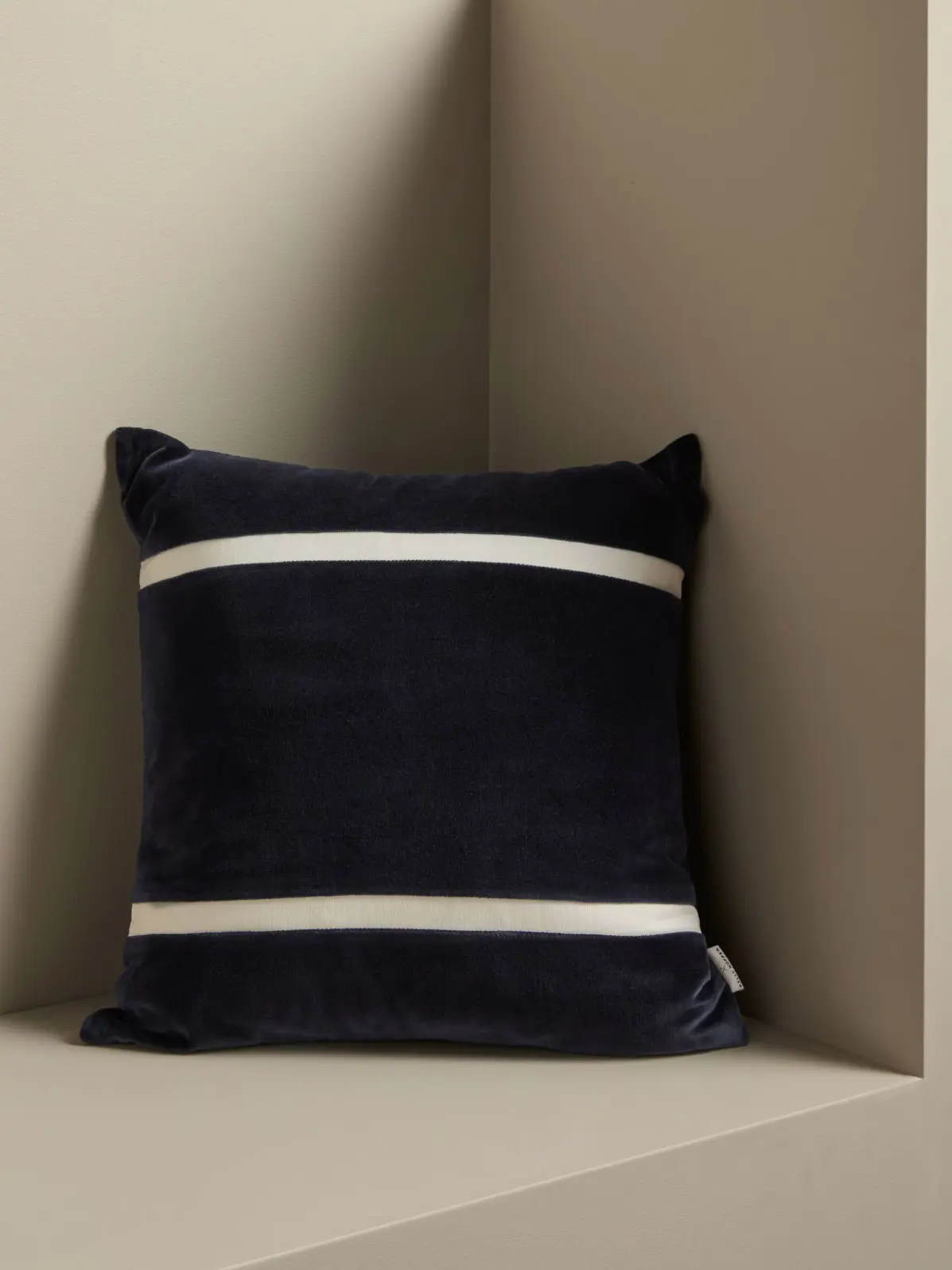 Monochrome cushion with stripe detail
