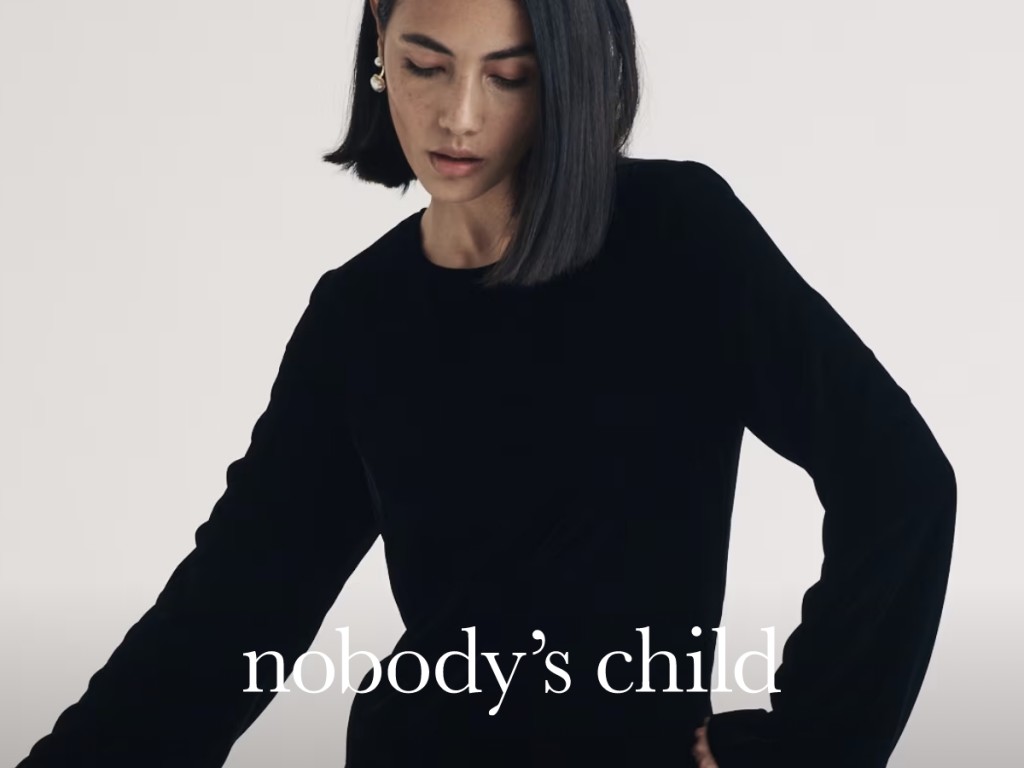 Women wearing black dresses in nobody's child . shop now 