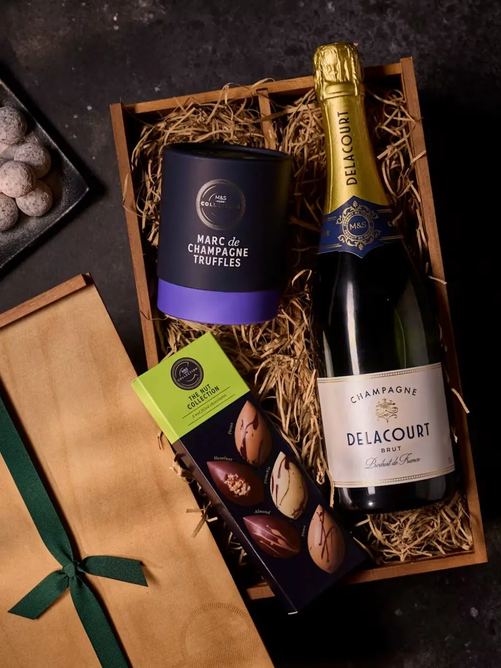 A bottle of champagne and chocolates