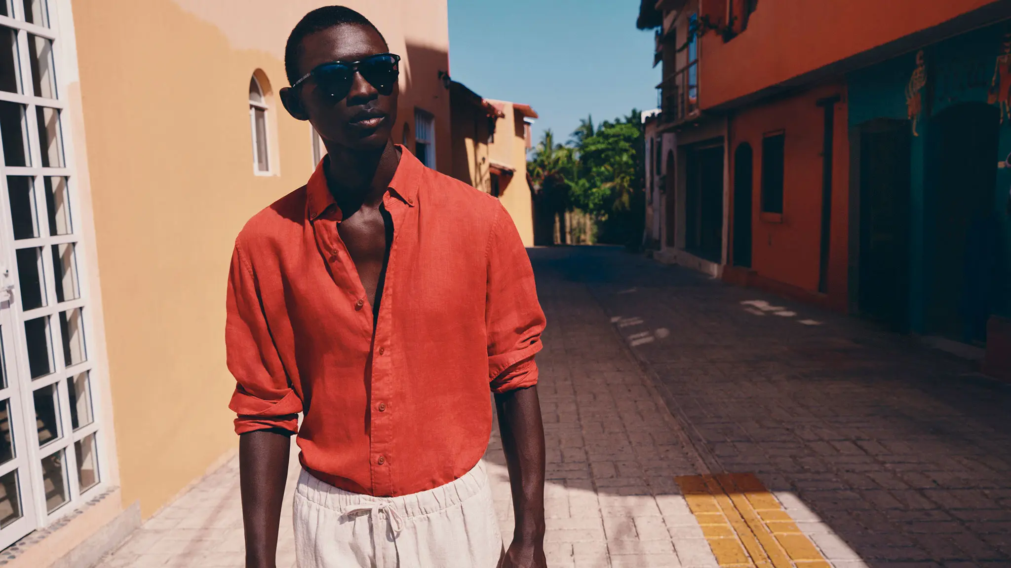 Man in orange shirt