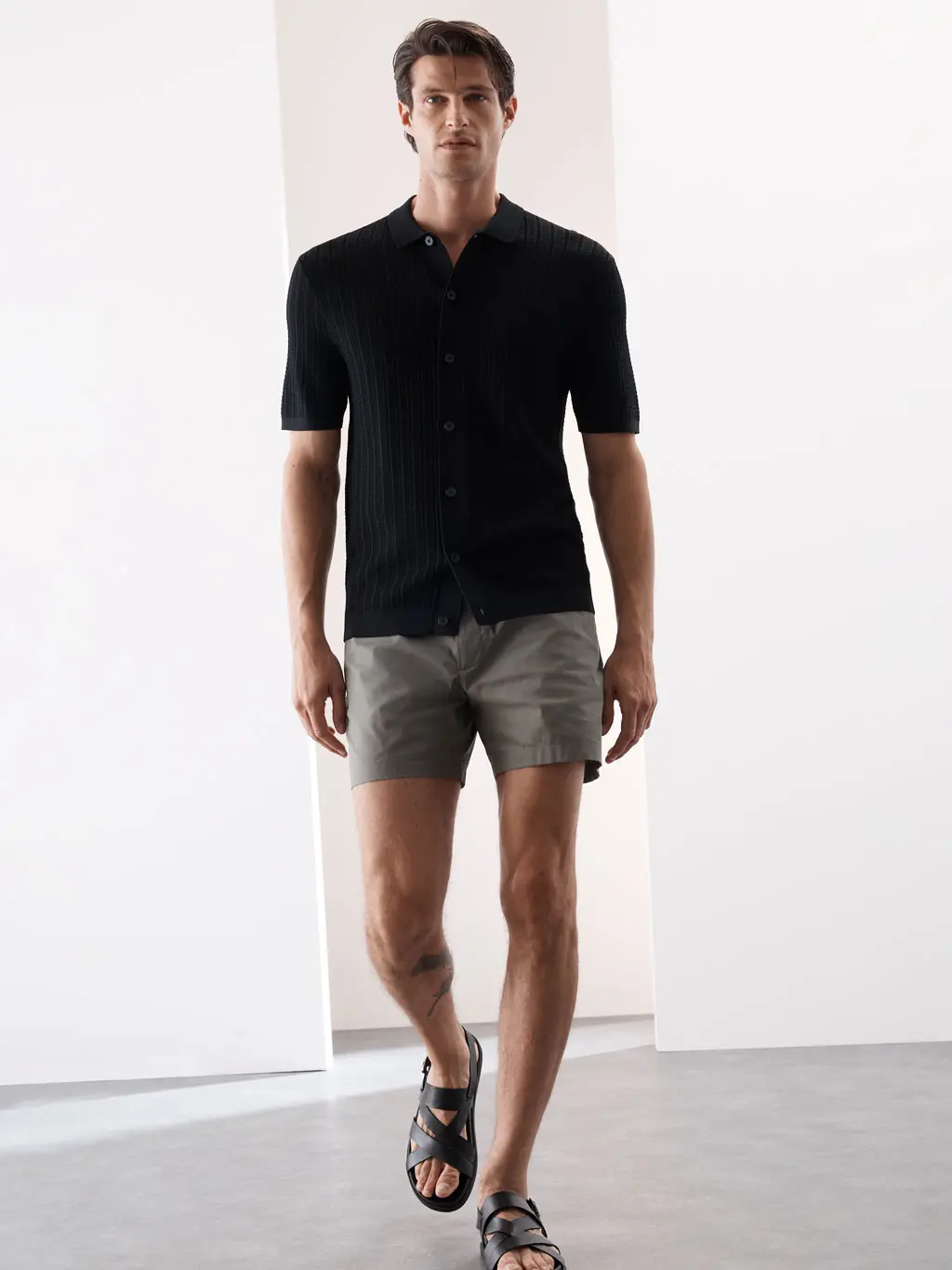Man wearing shorter length shorts