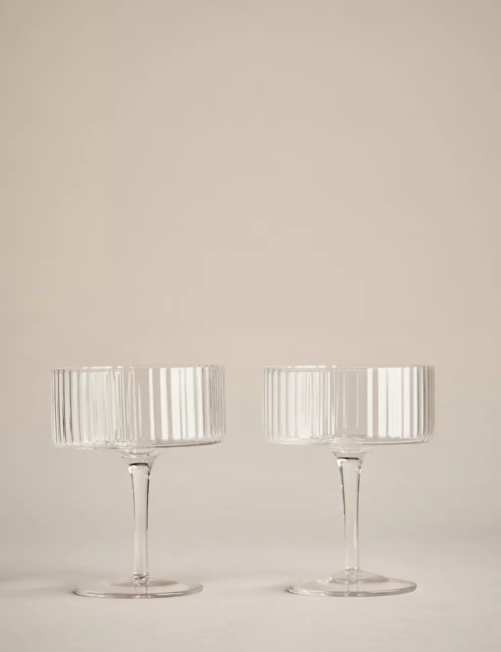 Two ribbed coupe glasses