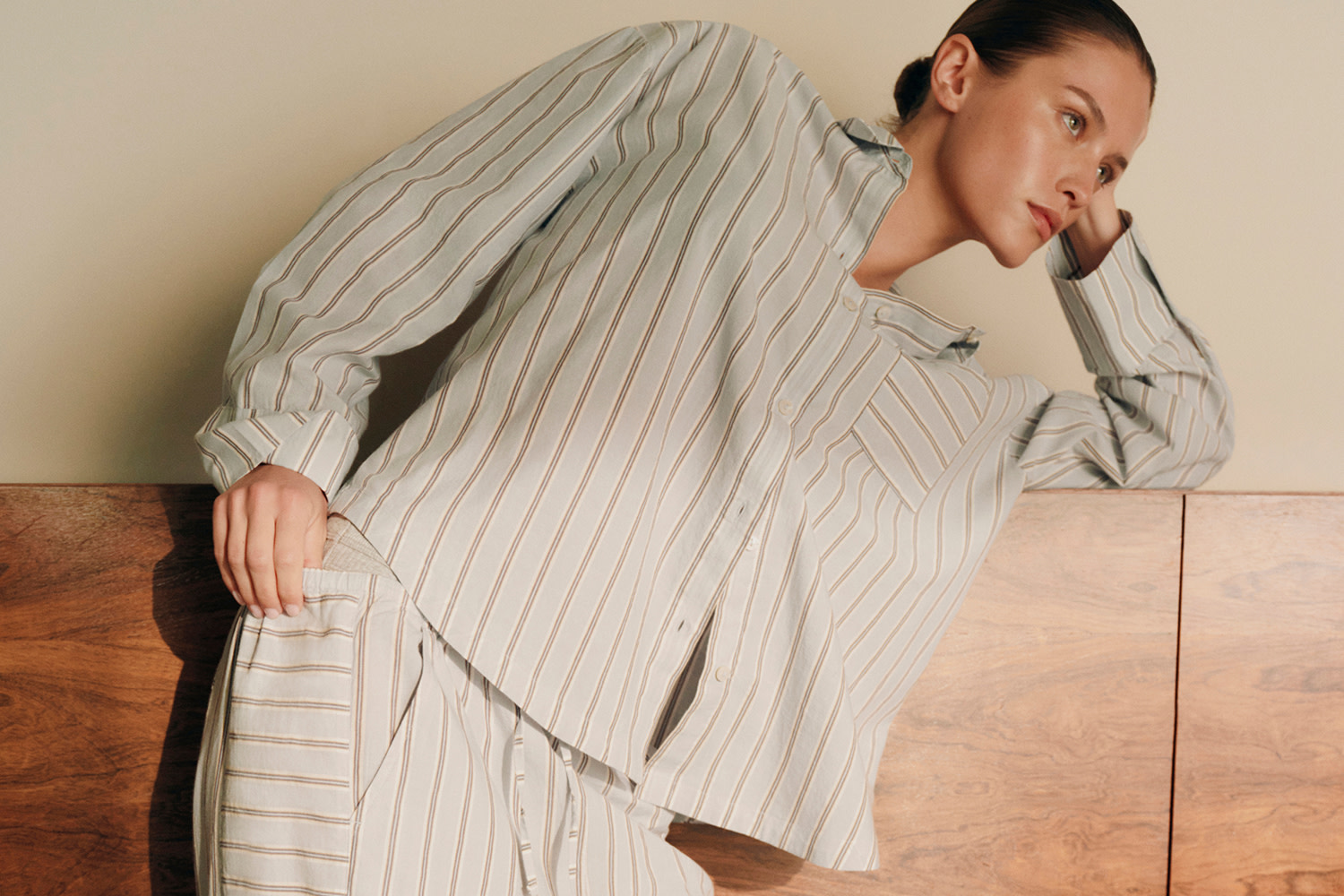 Woman wearing striped pyjamas