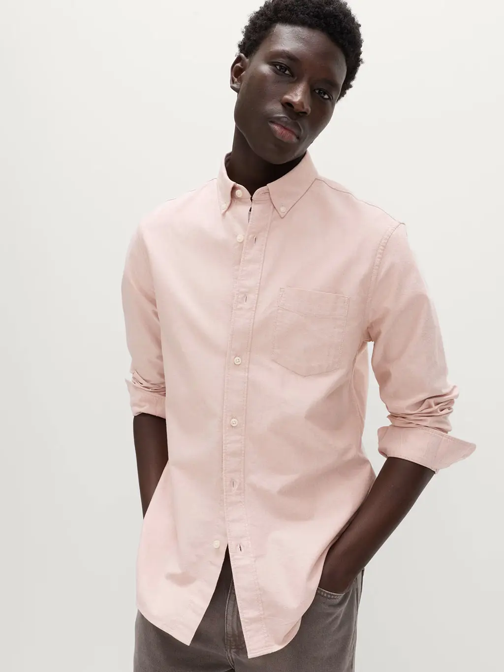Man wearing pink shirt